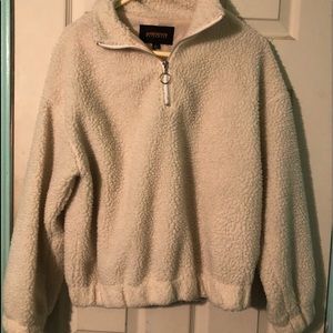 Woman’s teddy sweatshirt.